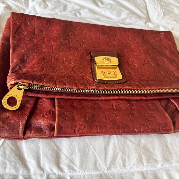 Marc Jacobs Handbags - Marc Jacobs Clutch with Gold Hardware
